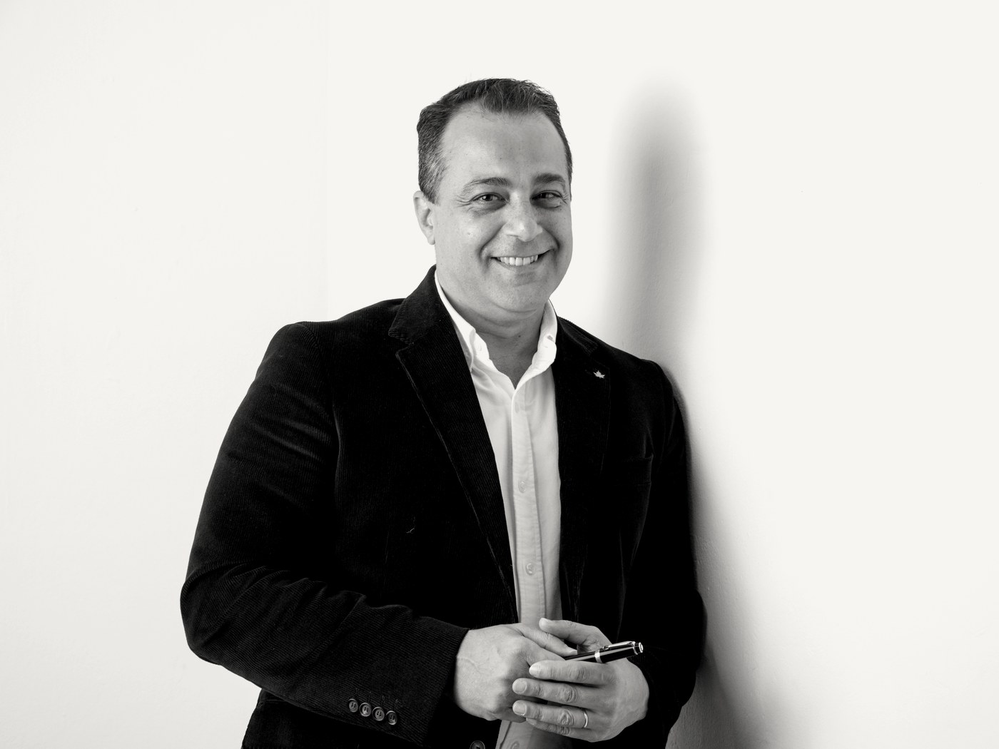 Christopher Cabrita, photographed against a white wall